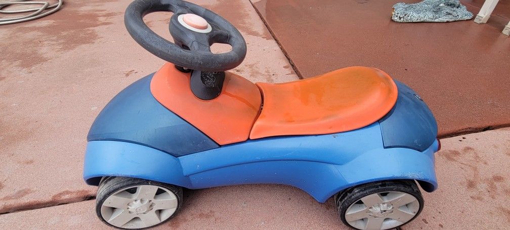BMW Baby Racer, a ride-on toy car for children. 
