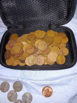 130 wheat pennies 2 nickels 1 silver dollar 7 steel pennies