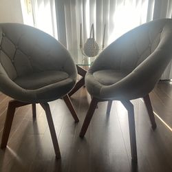 Two Swivel Accent Chairs
