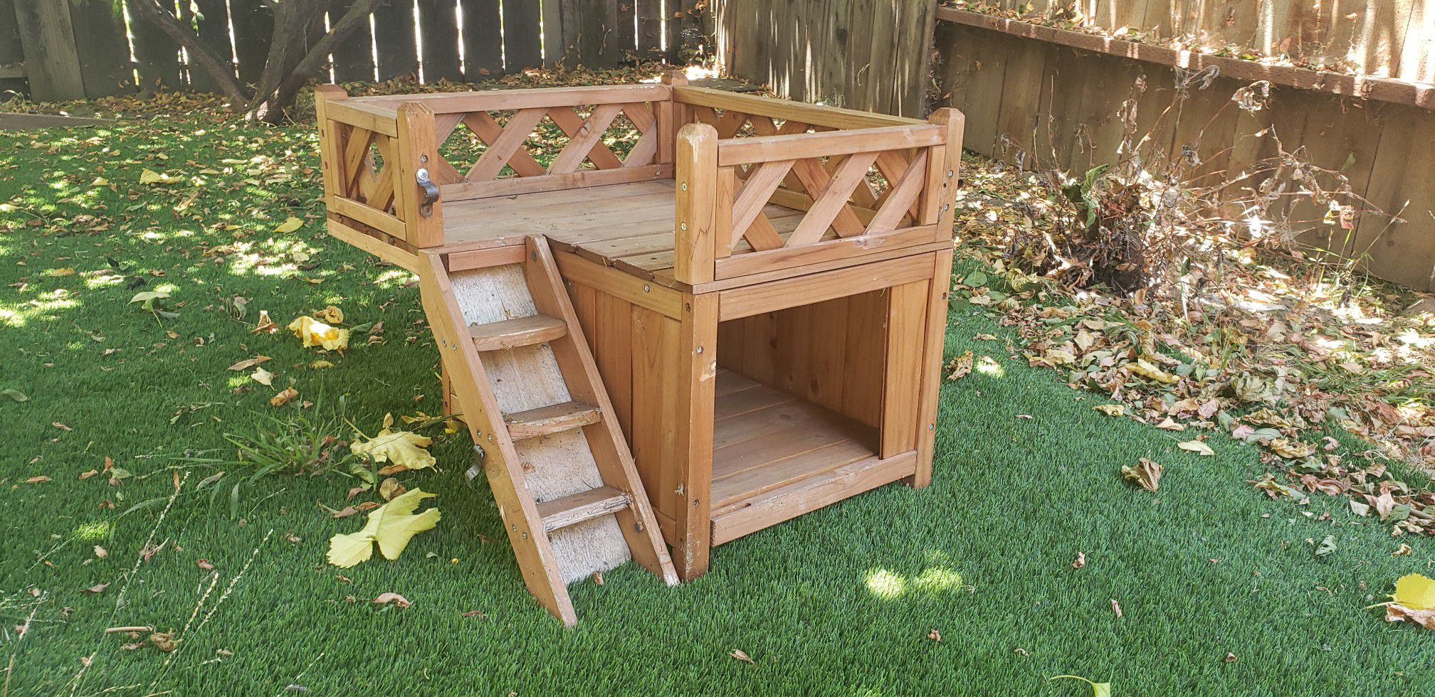 Small outdoor wood dog house