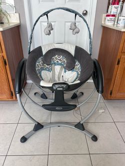 Graco Baby Glider Swing with Toy Bar