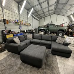 Dark Gray Section Couch With Ottoman (Free Delivery)