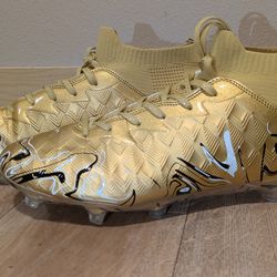 Gold high top soccer cleats