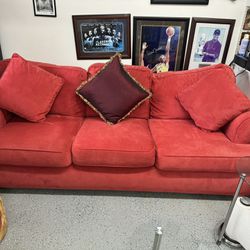 Two couches with pillows 