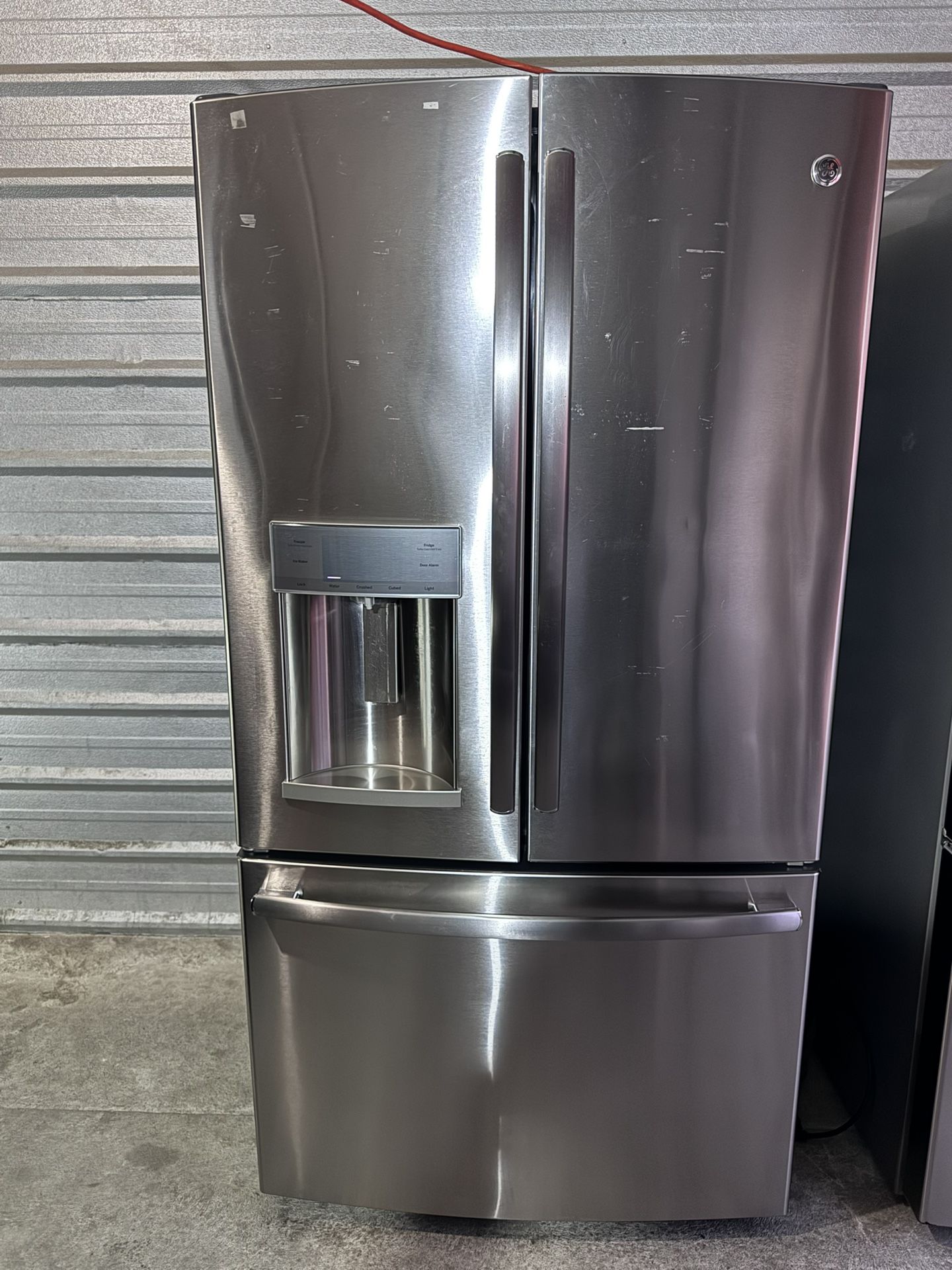 GE ENERGY STAR 25.7 Cu. Ft. French-Door Refrigerator with Water and ice Dispenser  Stainless Steel 