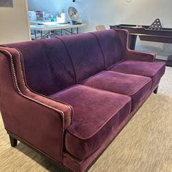 2 Swanky Velvet Sofas.