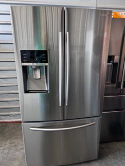 Samsung refrigerator French 3 door stainless steel with water and ice maker working perfectly. No issues at all. Dimensions 68 7/8 height 35 7/8 width
