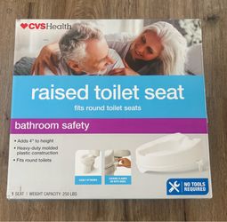 Raised toilet seat