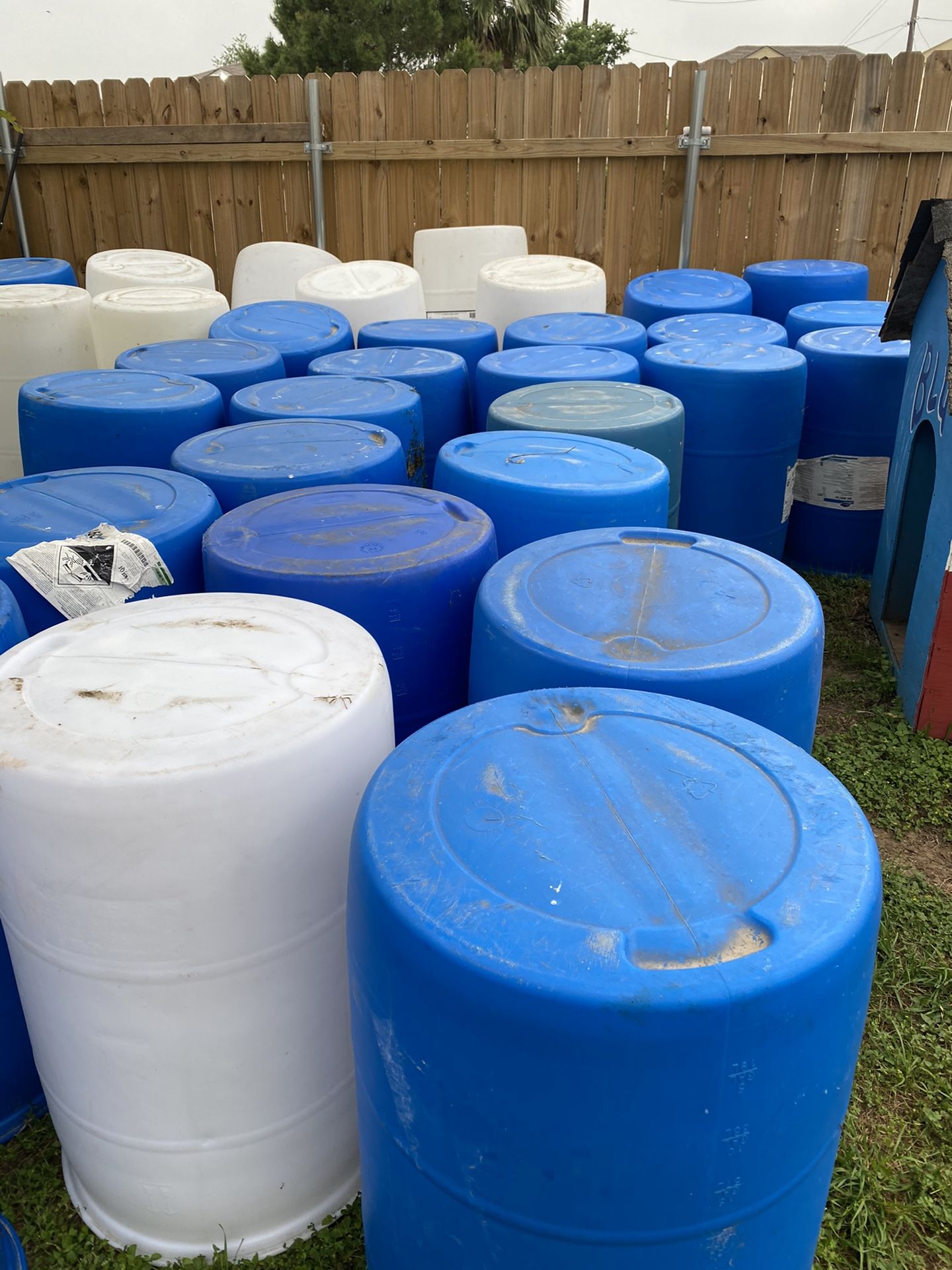 Plastic 55 gallon drums with 2 bung holes for sale. 20.00 each. for