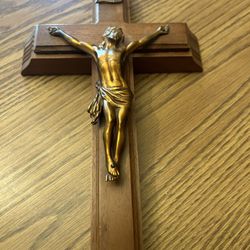 Crucifix with inner compartment and used candles