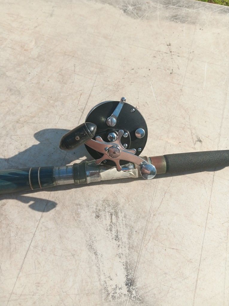 209 Penn fishing reel , On Heavy glass boat rod