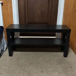 Small wooden shoe table