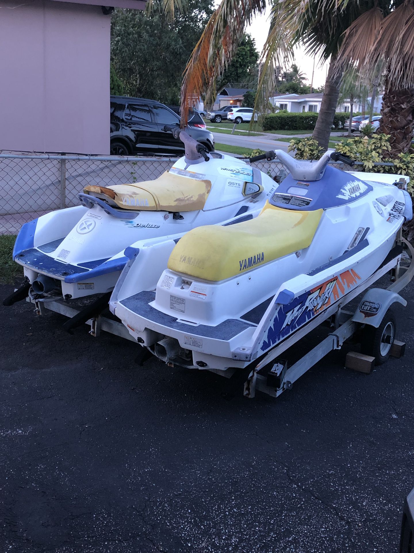 Two Jetskis and Double Trailer