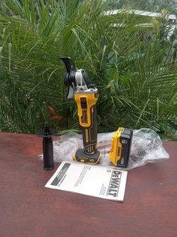 DeWalt 20 v New.   XR.  Grinder.   W/ handle.   Battery.   5.0 AH.  Lithium