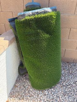 New artificial turf, approximately 11ft by approximately 40 inches, maybe slightly larger.