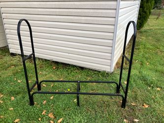Please list: Firewood holding rack