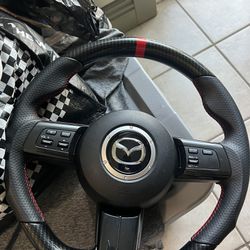Cipher Auto Enhanced Leather Steering Wheel for NC, Red Stitching, Carbon Fiber 