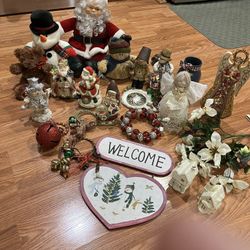 LOTS Of Christmas Decorations.   Angels, Stuffed Santa , Snowman And Bear. Yankee Candle Holder, Bells Snowman Figures, Welcome Sign. 