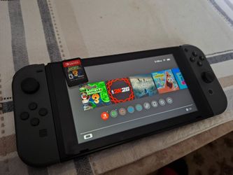Nintendo Switch with Luigi's Mansion 3