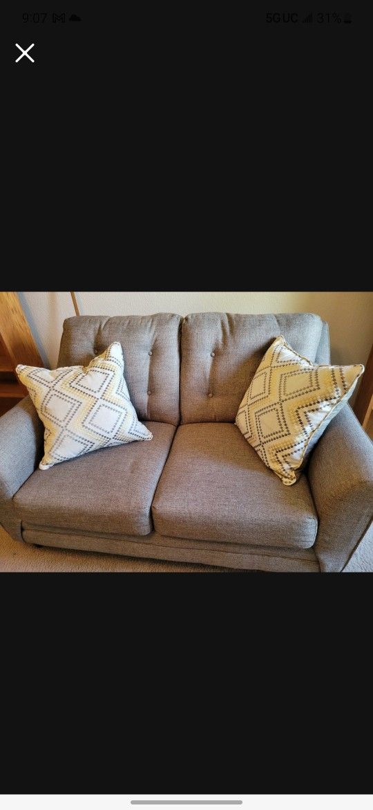 Grey Fabric Loveseat.