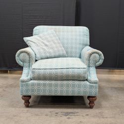 Comfortable Armchair with Green Wavy Pattern Slipcover