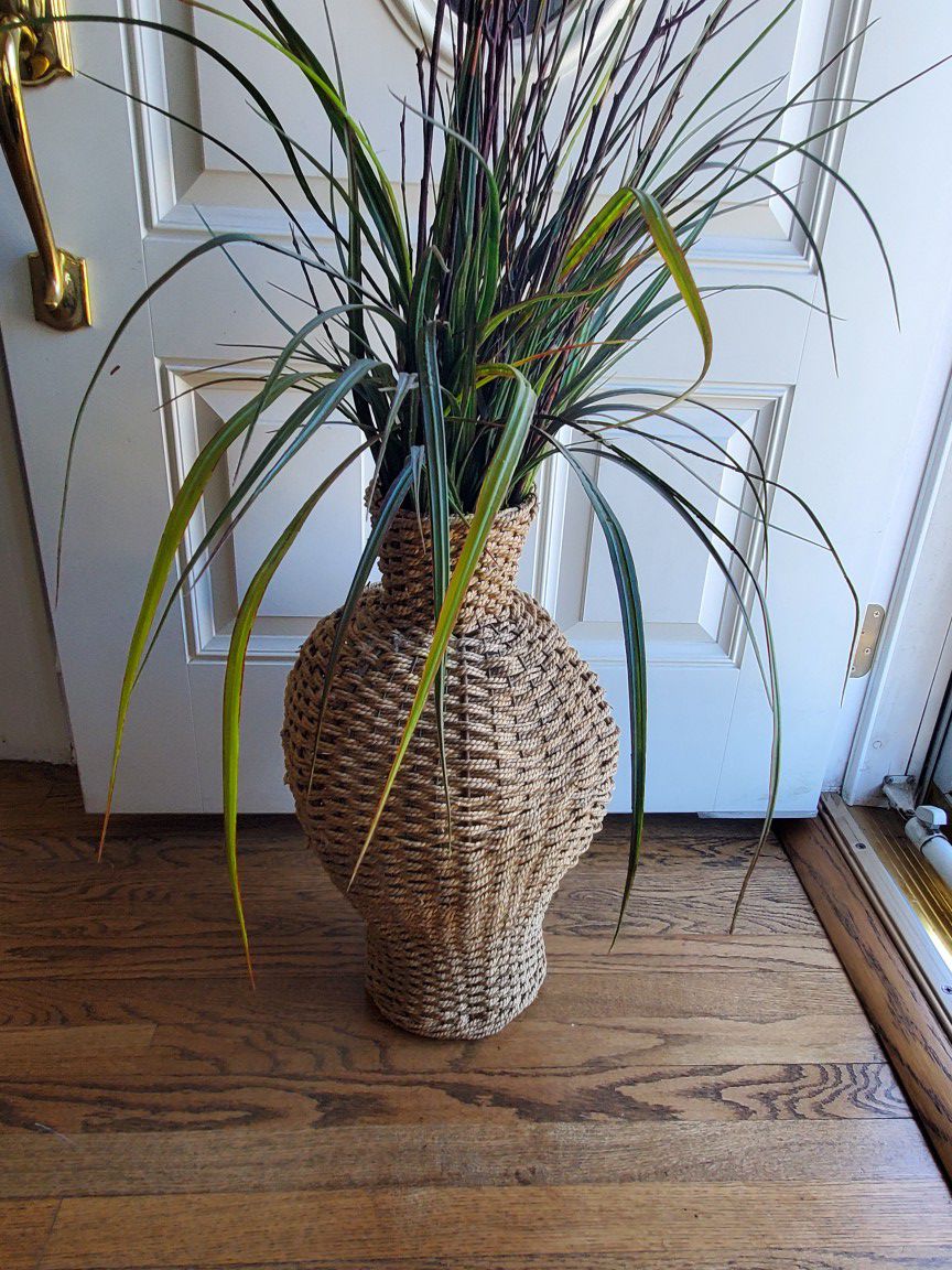 Gorgeous fake plant in wicker vase decor!