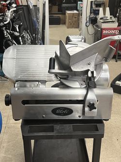 Globe 500L Commercial Automatic Deli Meat Cheese Vegetable Slicer with Sharpener $1,000