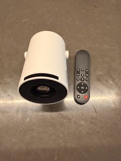 Mini Projector with WiFi 6 and Bluetooth 5.4 Support 4K 1080P Auto Keystone 180° Rotatable Projector