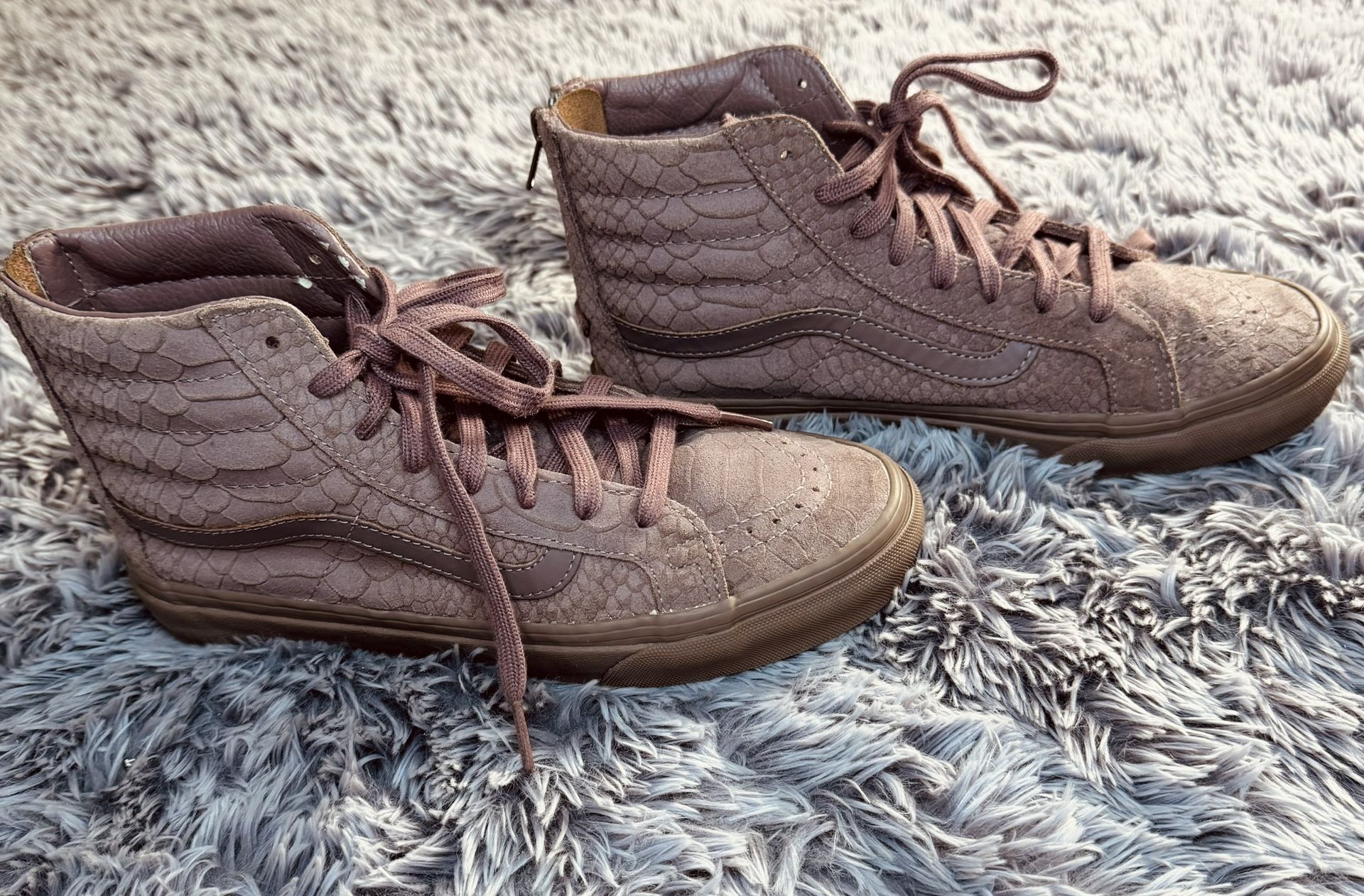 This is a pair of Vans Sk8-Hi Slim Zip DX Mono Python sneakers in the color Angora
