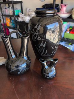 4 Matching Black Vases