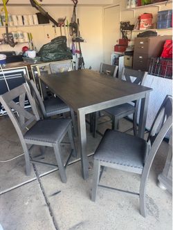 6 chairs and table