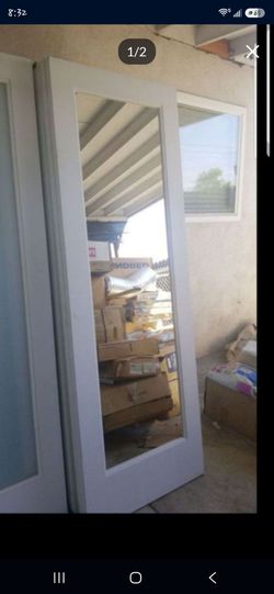 28x80 mirror door in both sides,,no frame, slab only