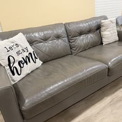 Grey Sofa, Table And Accent Chair With Ottoman