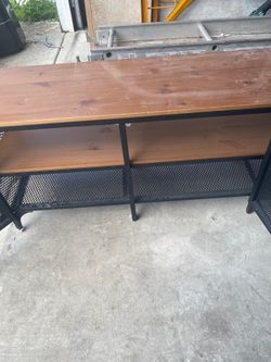 Wooden shelf with metal exterior
