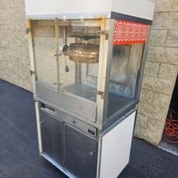 Cretors commercial popcorn machine.
20 oz kettle
Has oil warmer & built in pump
Requires 30 amp outlet

A new machine like this is $12,000
