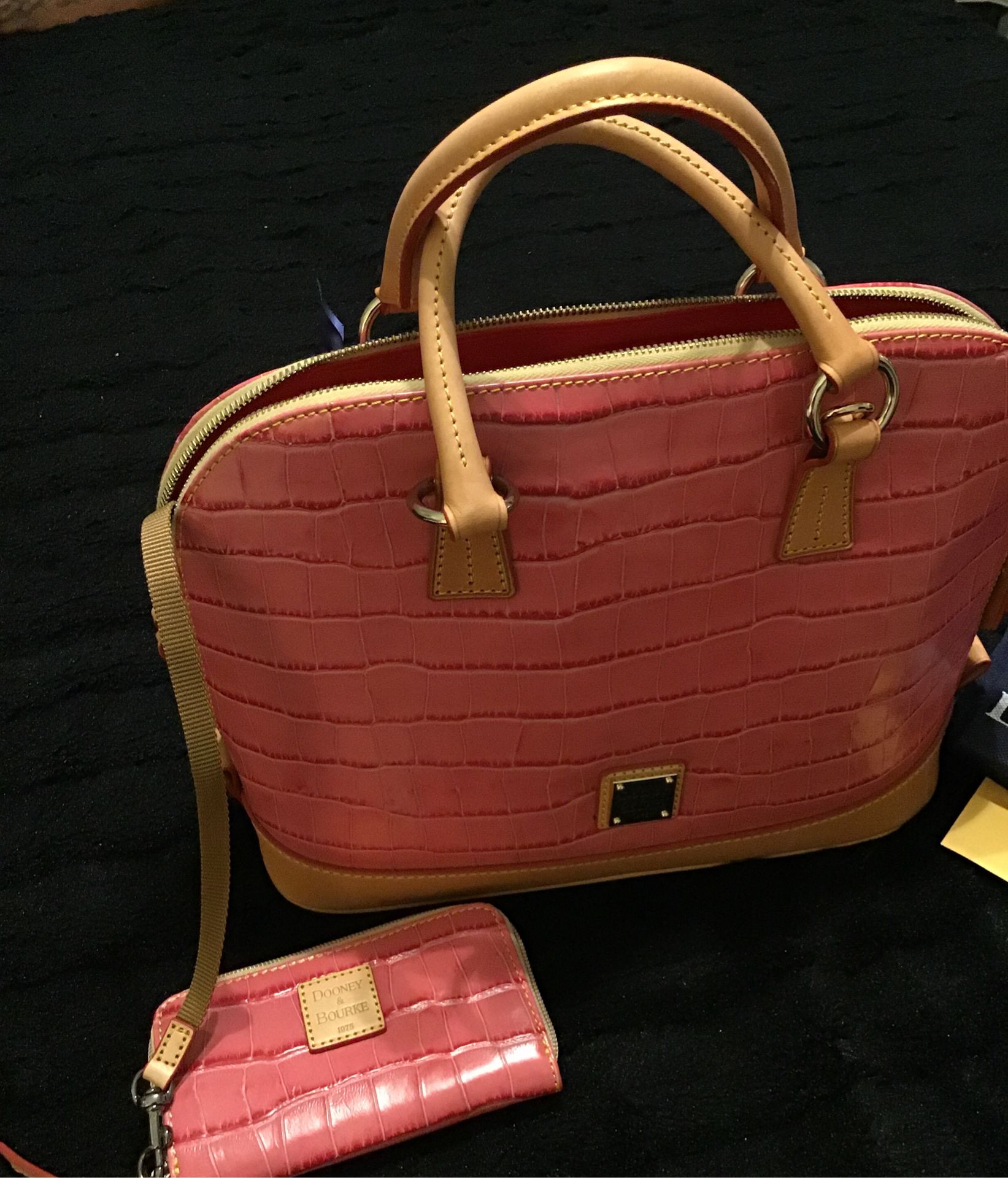 Purse: Dooney & Bourke (pink and tan) were having a yard sale 1427 W. 90th Pl. LA CA 90047 *** 8.22.30 at 8am to 3pm lots of other things too