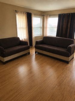 Two piece leather loveseat and living sofa