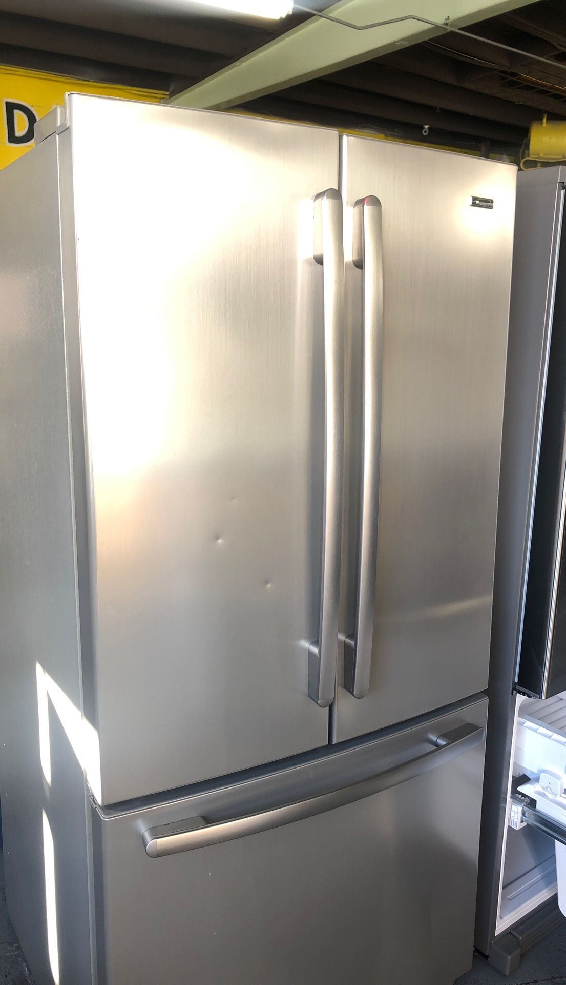 Kenmore 3 doors Stainlees steel $450. Apartament sizes