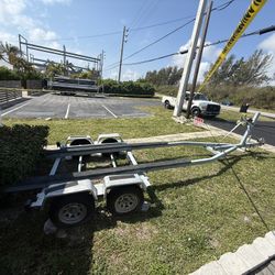 Shore Small boat trailer…. 23 Feet Long , 12 Foot Bunks