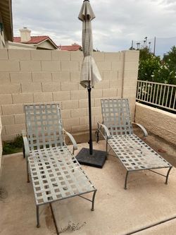 Two metal frame loungers