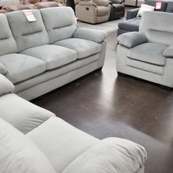 Light gray fabric sofa love and chair