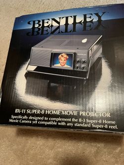 Super Eight Home Movie Projector And Super Eight Movie Camera