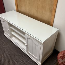 White cabinet with glass top