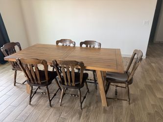 Dining room table with chairs