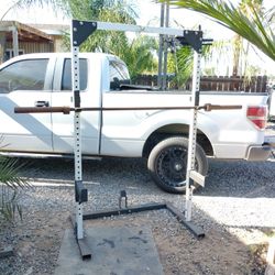 Squat Rack And Olympic Bar