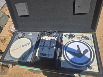 Roland 909 turntable, mixer, and dj coffin by odyssey