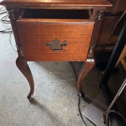 Acute end table put it in your dining room kitchen our bedroom. It's cute.