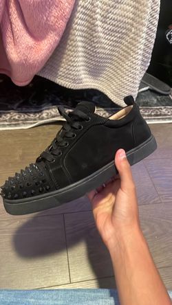 Cristian Louboutin‘s red bottoms size 9