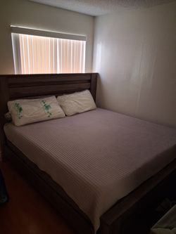 Selling a bed with dresser.