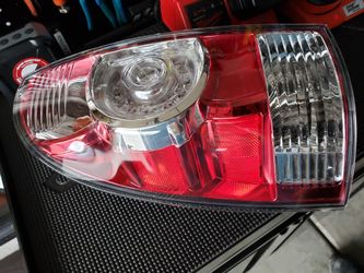 Toyota tacoma tali light driver side . New
